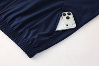 Chaqueta y pantalón impermeables de España Chándal